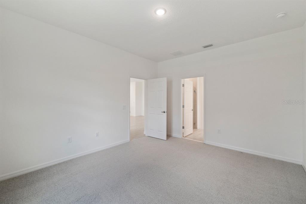 5942 Vision Road St. Cloud, FL 34771 - Photo 7 of 11 Primary Bedroom