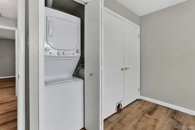 a view of a hallway with washer and dryer