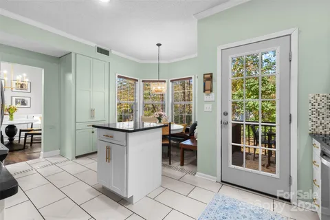 a view of kitchen with windows
