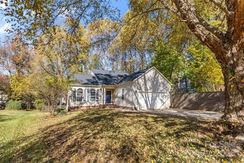 a house with trees in front of it