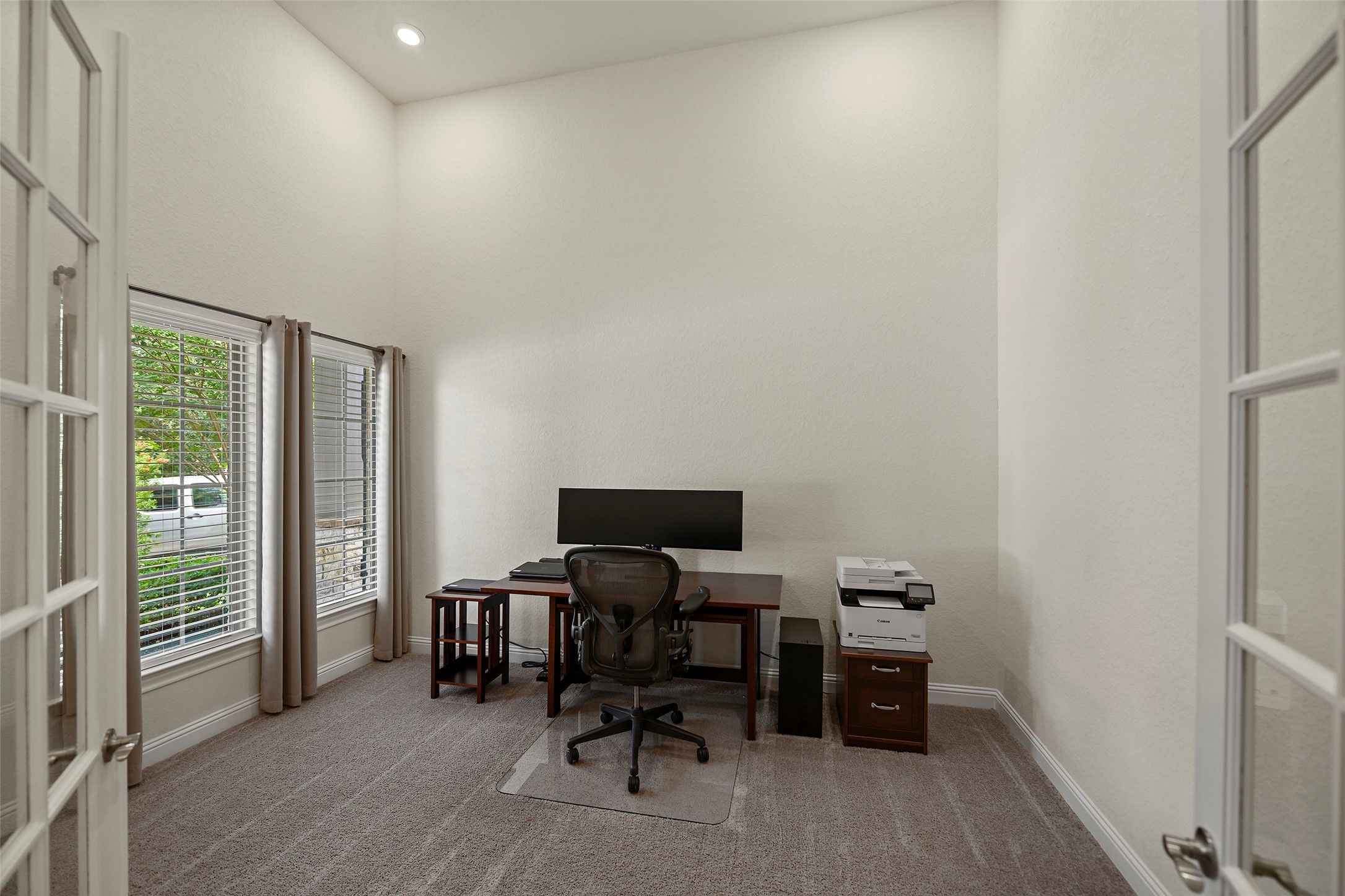 20330 Rosegold Way Spring, TX 77379 - Photo 23 of 48 Private home office with French doors, tall ceilings, and large front-facing windows.