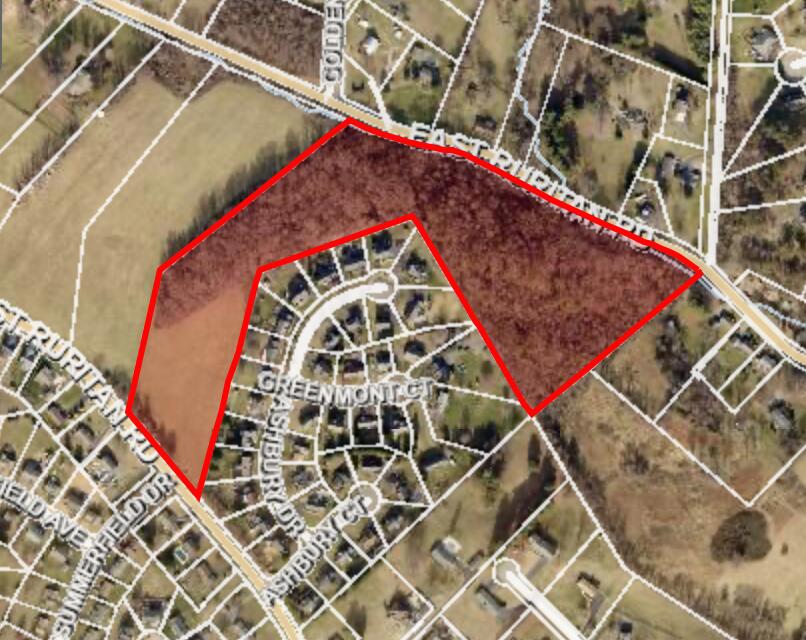 view of a walk in front of with building