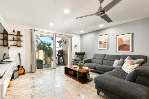 a living room with furniture and a window