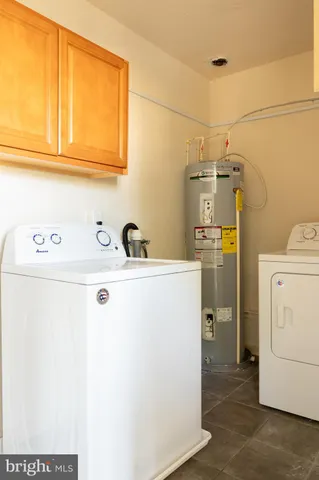 a view of a livingroom with an empty space and a window