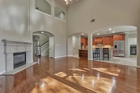 a view of a kitchen with furniture and a fireplace