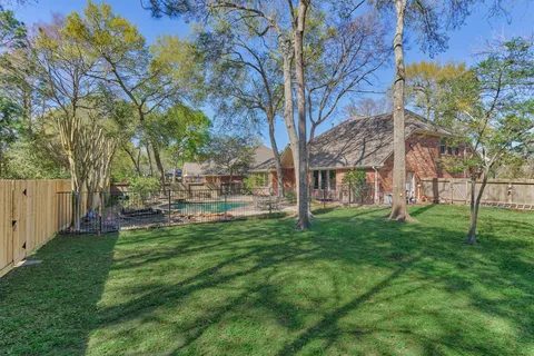 a view of a house with a big yard