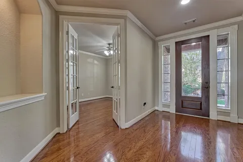 wooden floor and closet in a room