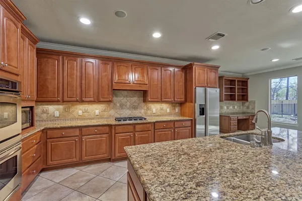 $899,000 | 34 Pawprint Place, The Woodlands, TX 77382