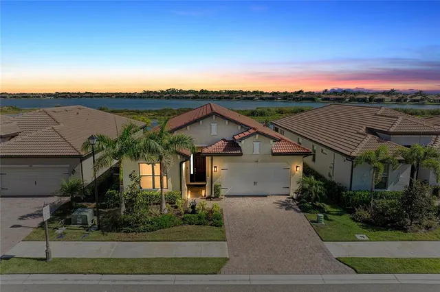 a view of a lake with a swimming pool