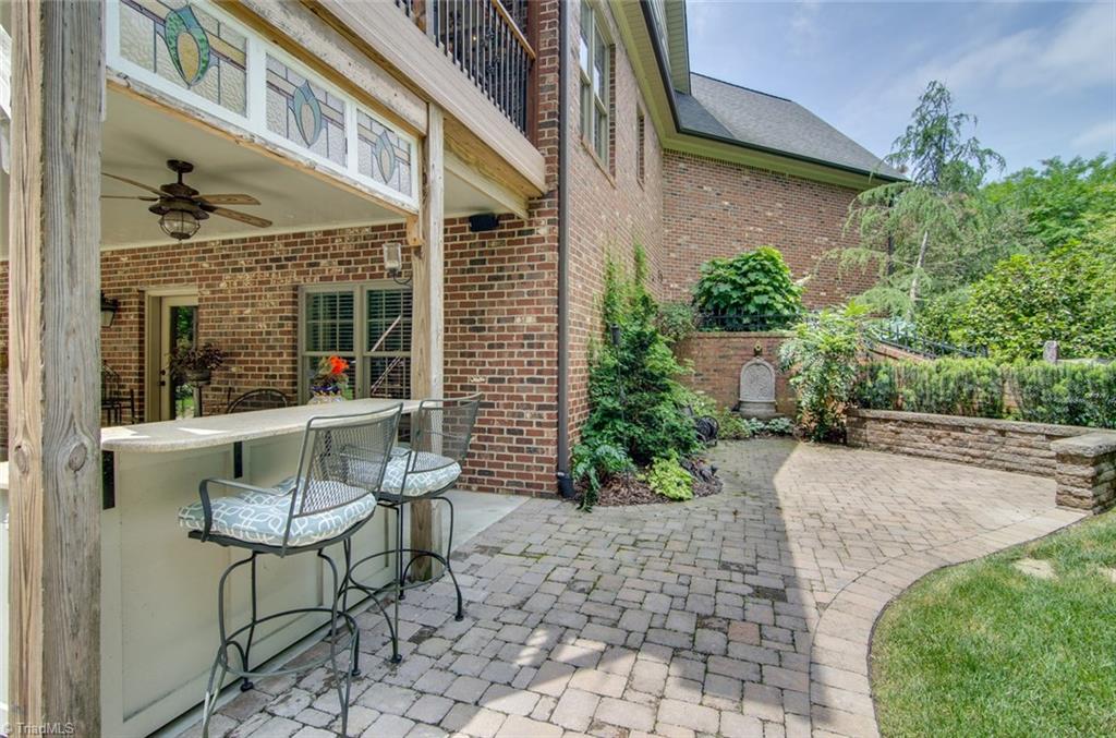 5032 Bennington Way High Point, NC 27262 - Photo 24 of 30 Bar area & Stone patio for those private moments