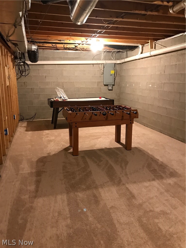 55101 Iowa Road Cumberland, OH 43732 - Photo 26 of 30 12 foot by 29 foot basement recreation room with full size air hockey and Foosball table. Could also make it a theater room with screen on a wall and projector hung from ceiling.
