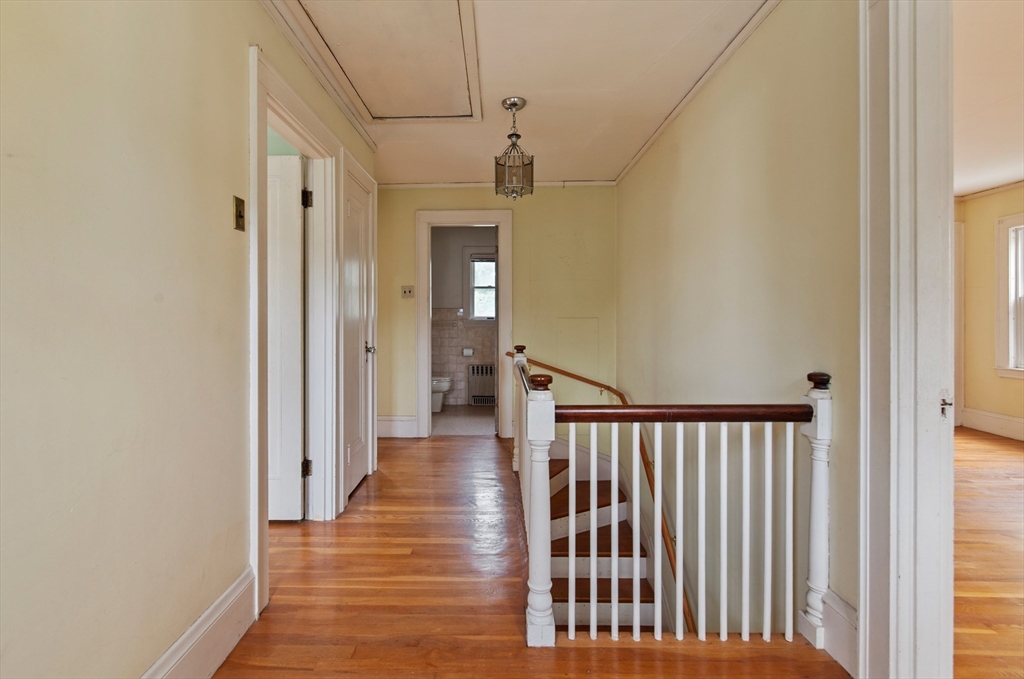 38 Bailey Road Arlington, MA 02476 - Photo 13 of 30 a view of a hallway with wooden floor