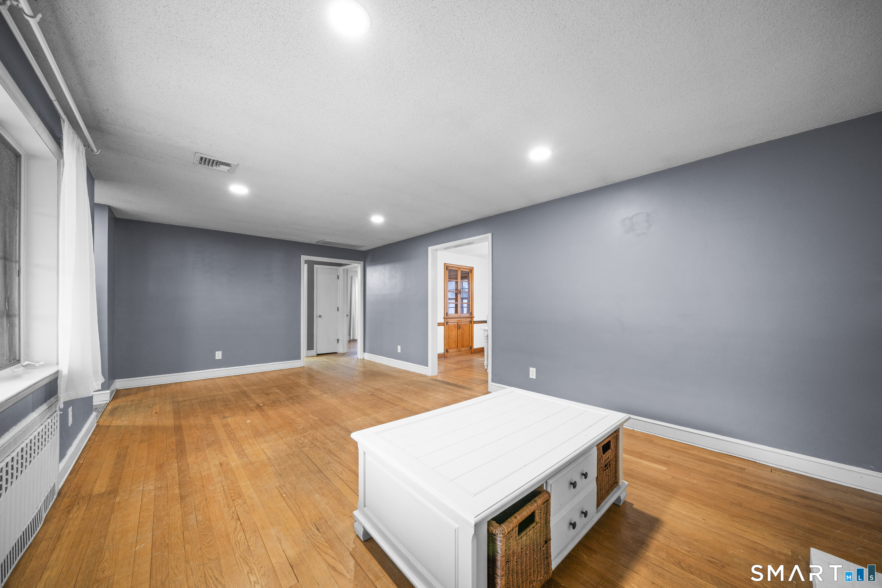 514 Hilliard Street Manchester, CT 06042 - Photo 13 of 38 a room with a bed and a table