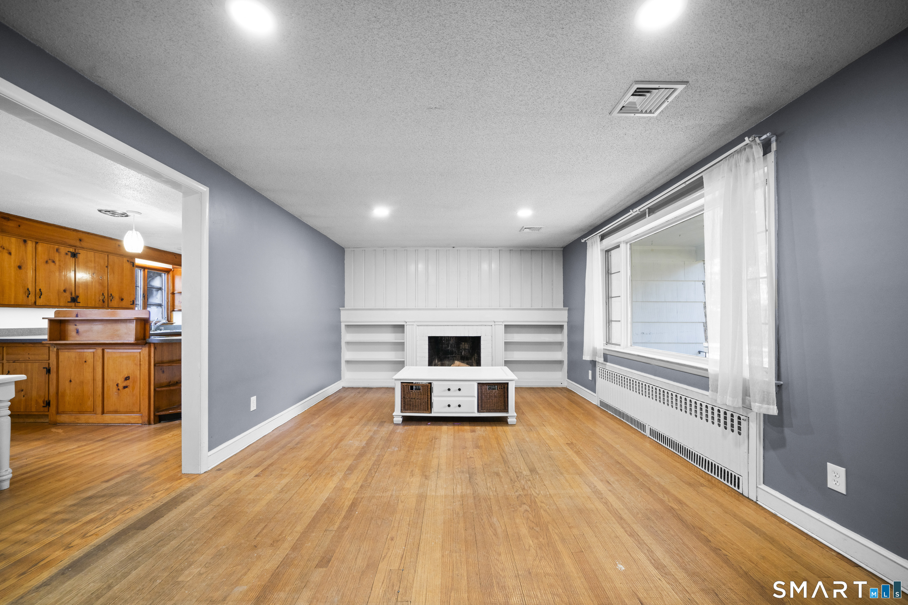 514 Hilliard Street Manchester, CT 06042 - Photo 14 of 38 a hallway with wooden floor