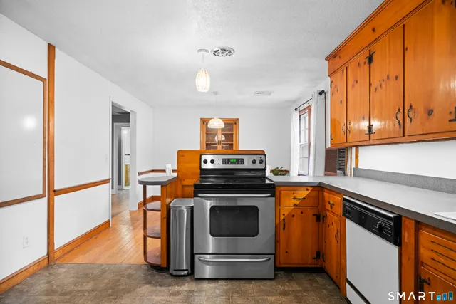 a kitchen with a stove and a sink