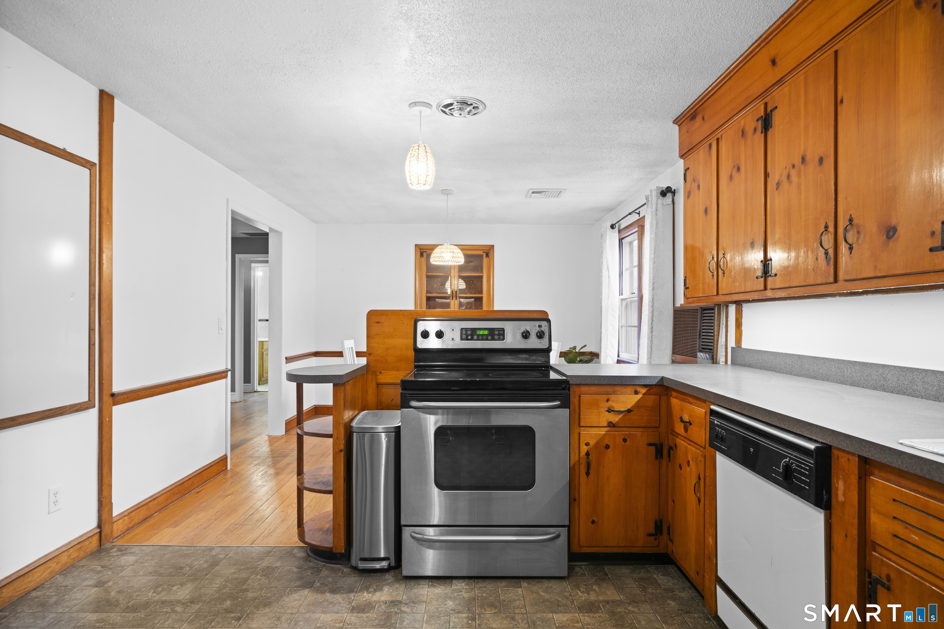 514 Hilliard Street Manchester, CT 06042 - Photo 16 of 38 a kitchen with a stove and a sink