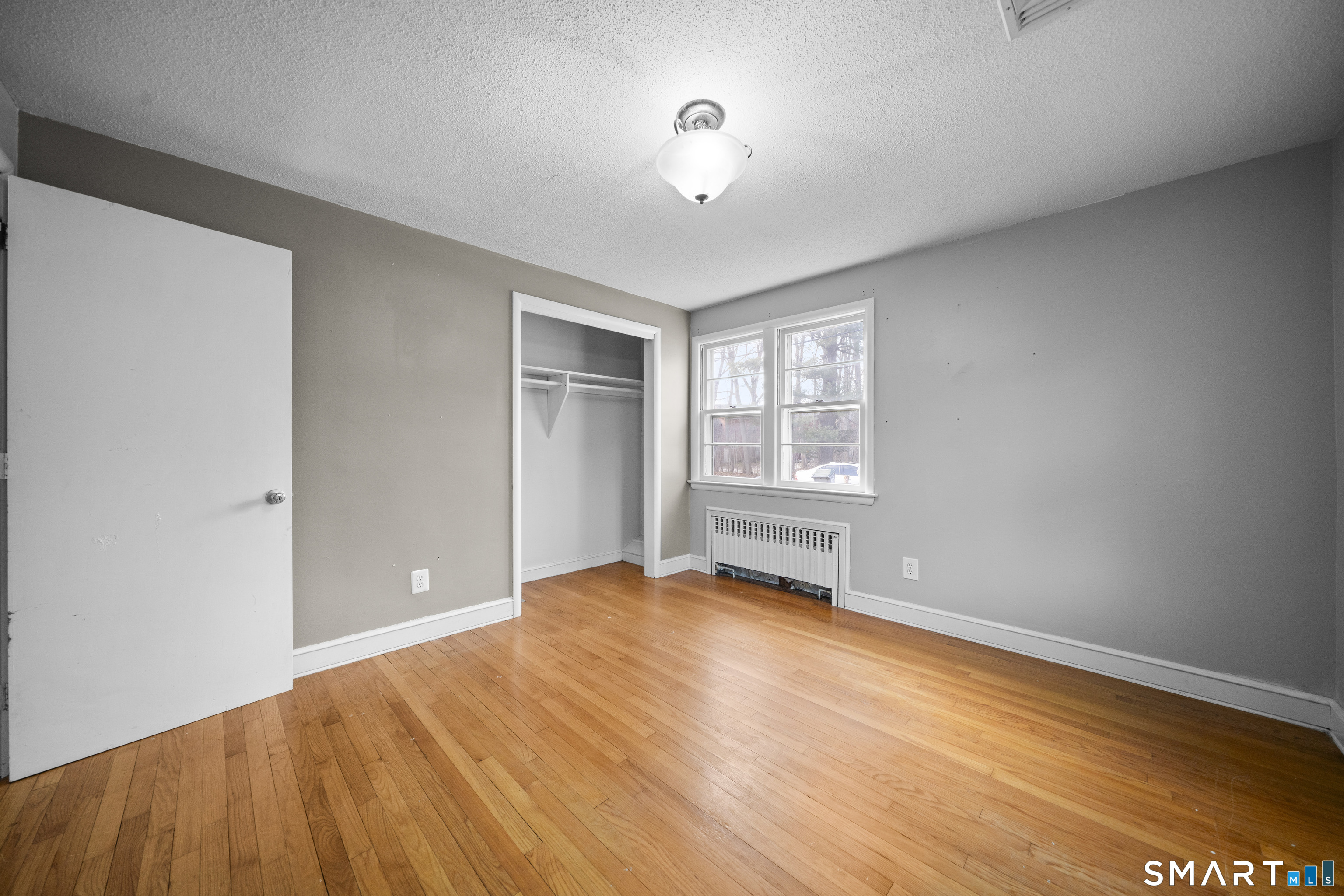 514 Hilliard Street Manchester, CT 06042 - Photo 25 of 38 an empty room with windows