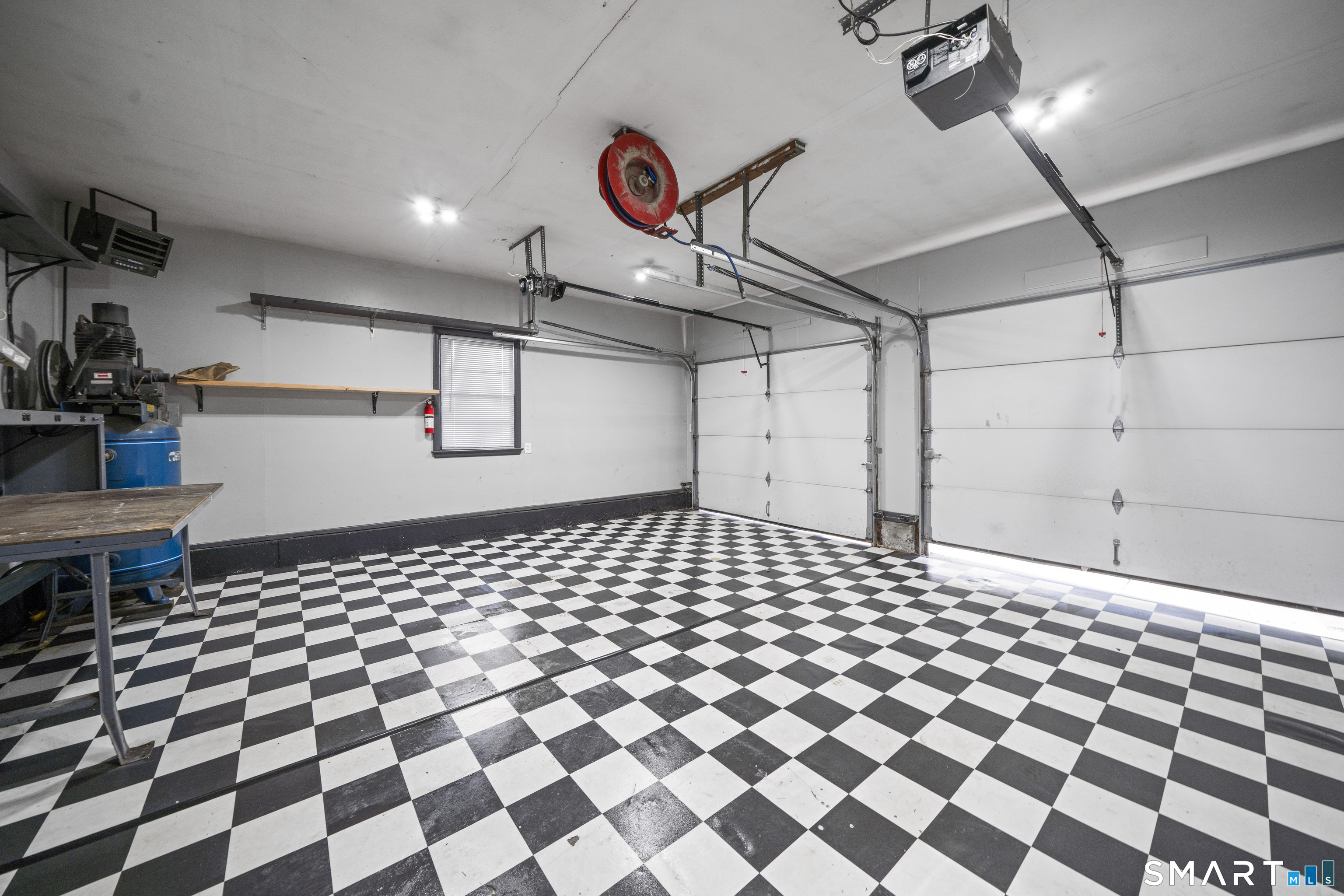 514 Hilliard Street Manchester, CT 06042 - Photo 3 of 38 a black and white checkered floor