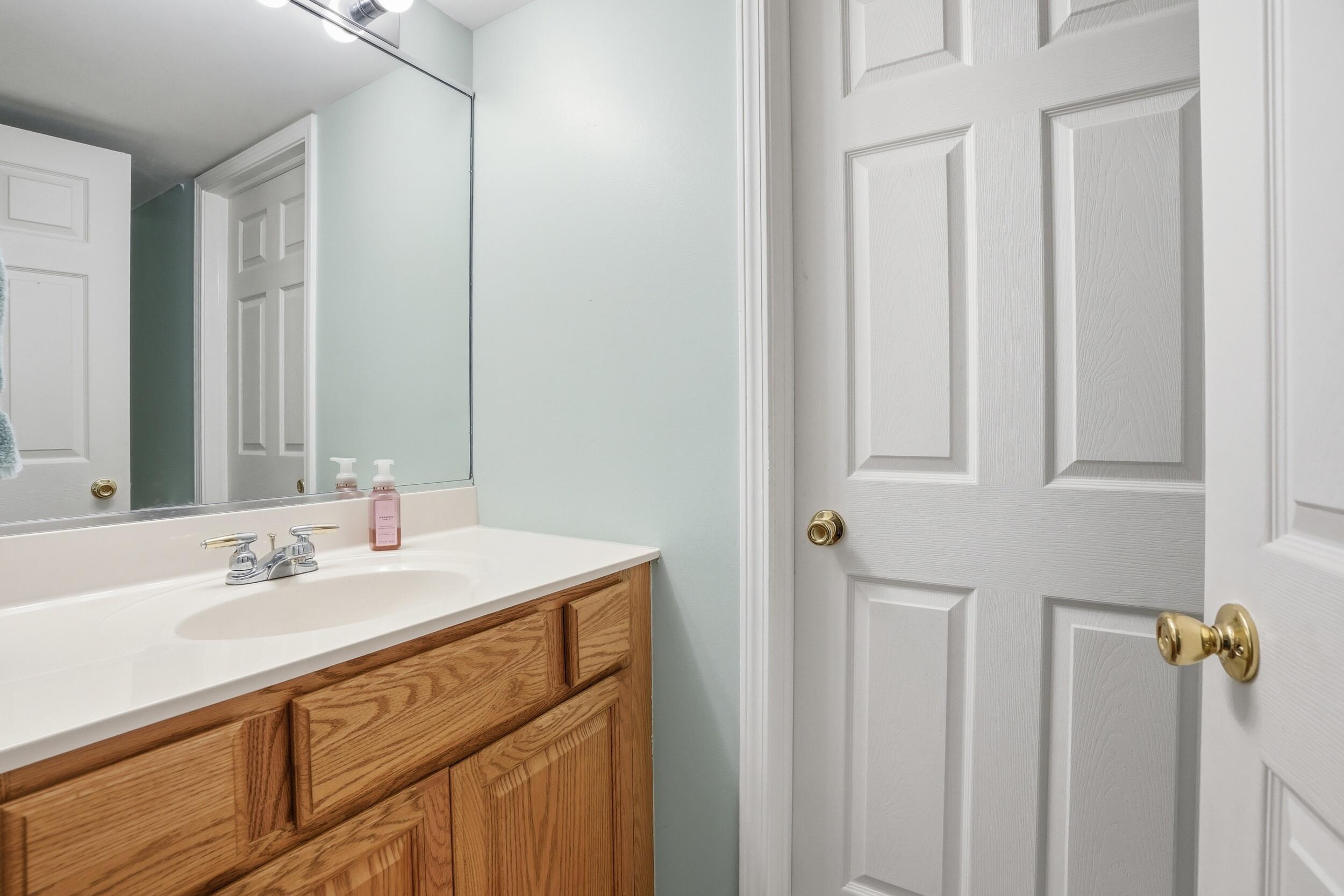 2184 Timberidge Lane Highland, IN 46322 - Photo 9 of 18 a bathroom with a sink and a mirror