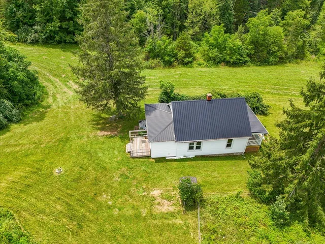 a view of a lake with a yard