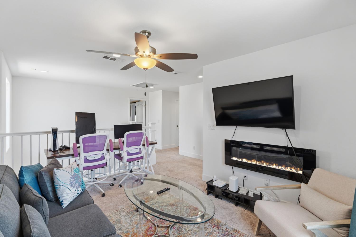6326 West Richert Avenue Fresno, CA 93723 - Photo 22 of 45 a living room with furniture and a flat screen tv