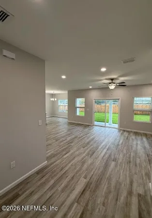 a view of empty room with a window