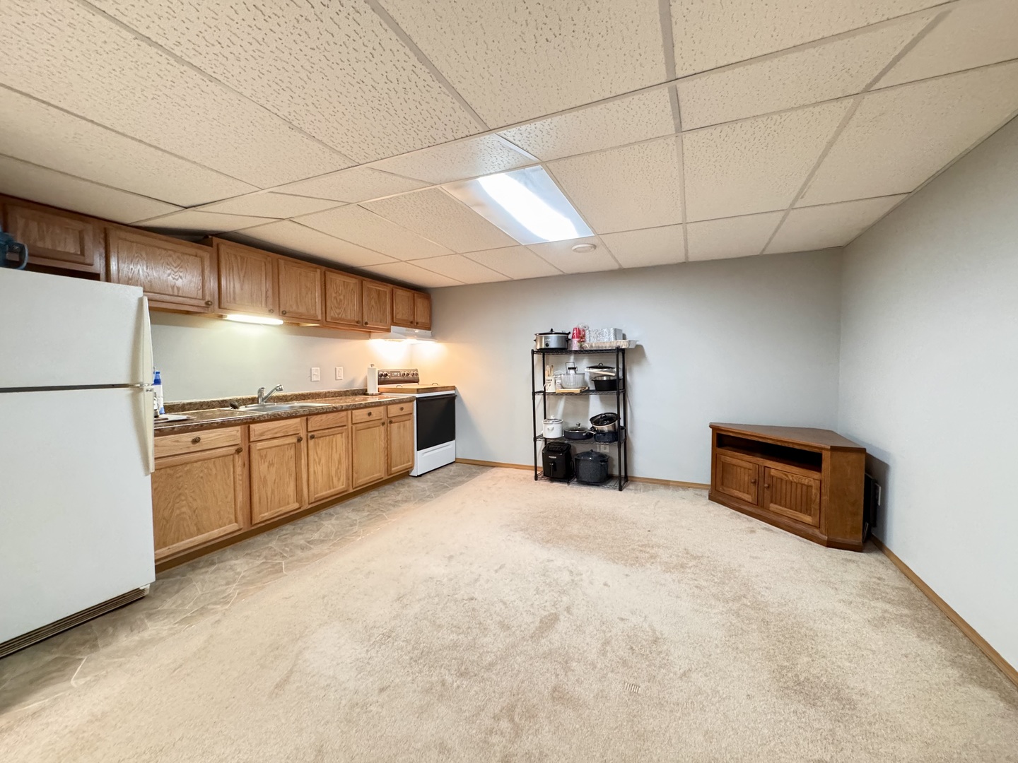 402 Woodside Place Dixon, IL 61021 - Photo 11 of 17 a kitchen with refrigerator and cabinets
