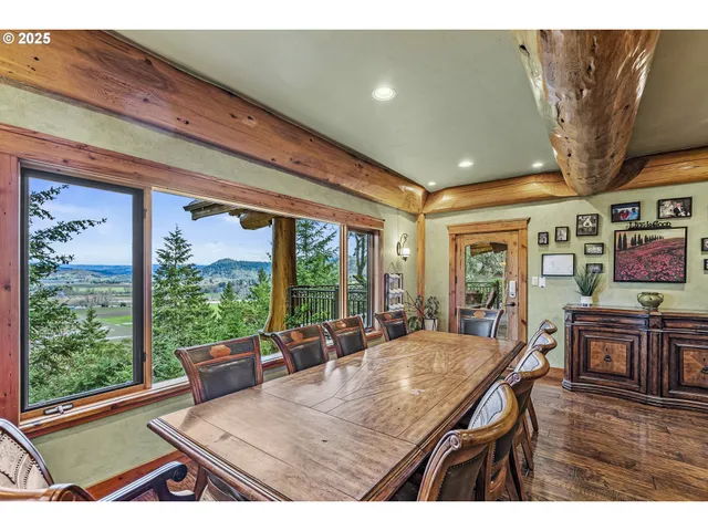 a view of a dining room with furniture window and outside view