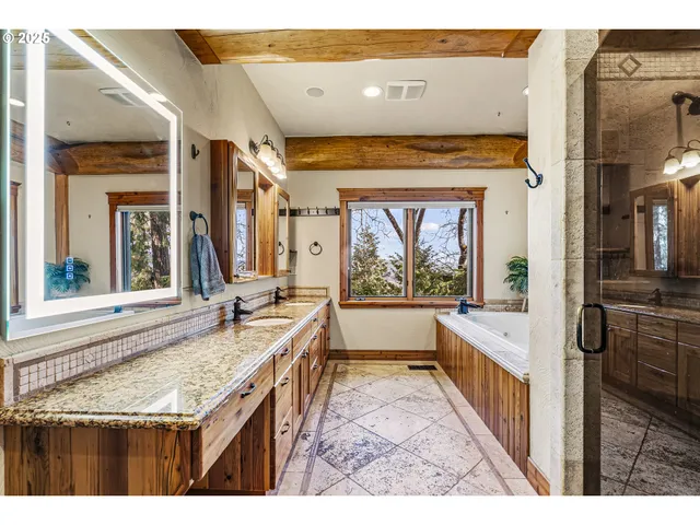 a open kitchen with granite countertop a sink and a refrigerator