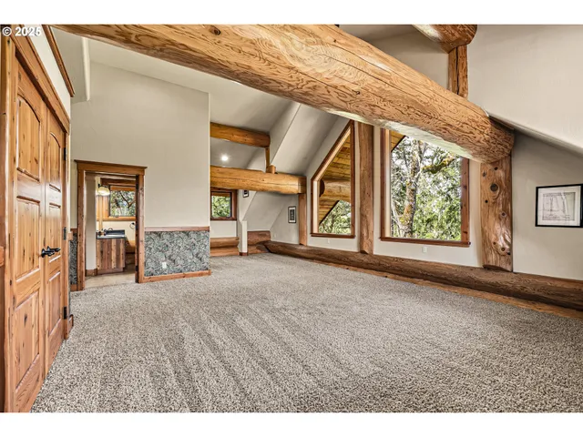 a view of livingroom with furniture and windows