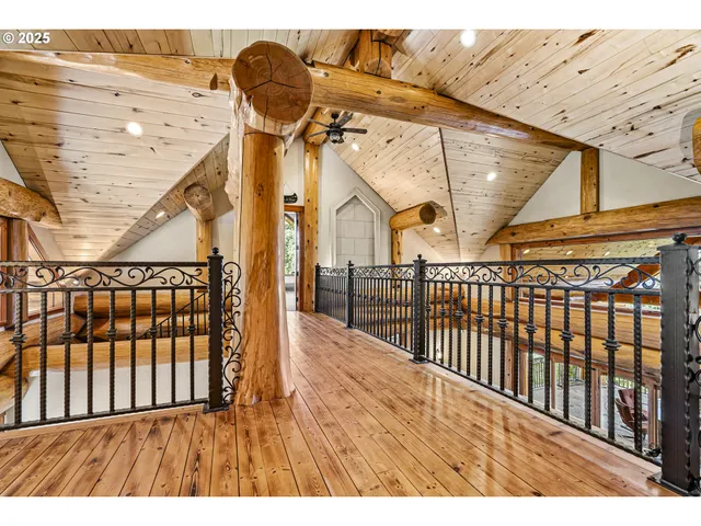 a view of a balcony with wooden floor