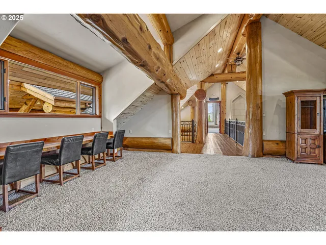 a view of an empty room with stairs