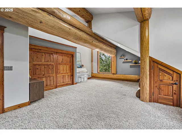 a view of an entryway with wooden door