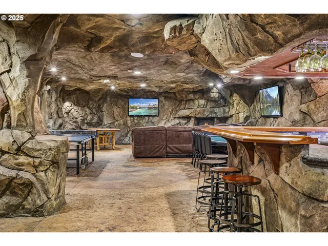 a view of a chairs and table in a patio