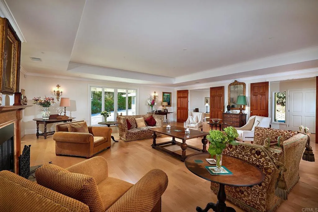 4613 Sun Valley Road Del Mar, CA 92014 - Photo 11 of 55 a living room with furniture kitchen view and a large window