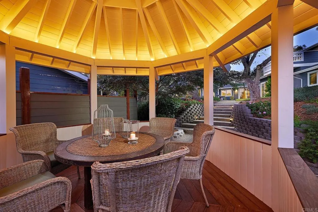 4613 Sun Valley Road Del Mar, CA 92014 - Photo 30 of 55 a dining room with furniture and wooden floor