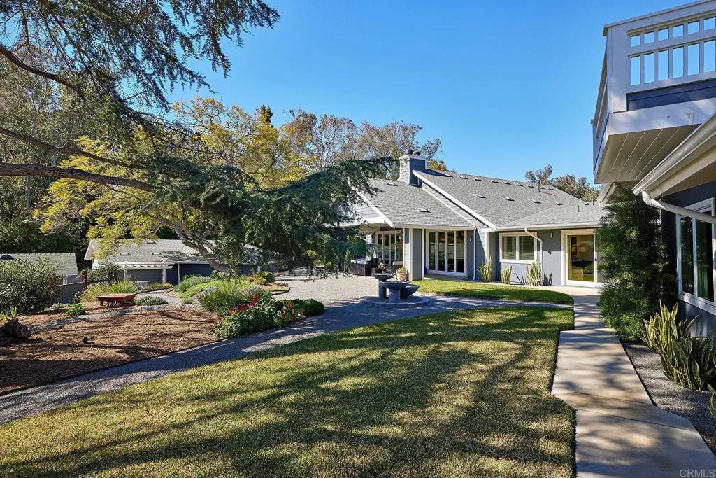 4613 Sun Valley Road Del Mar, CA 92014 - Photo 34 of 55 a view of a house with pool and chairs