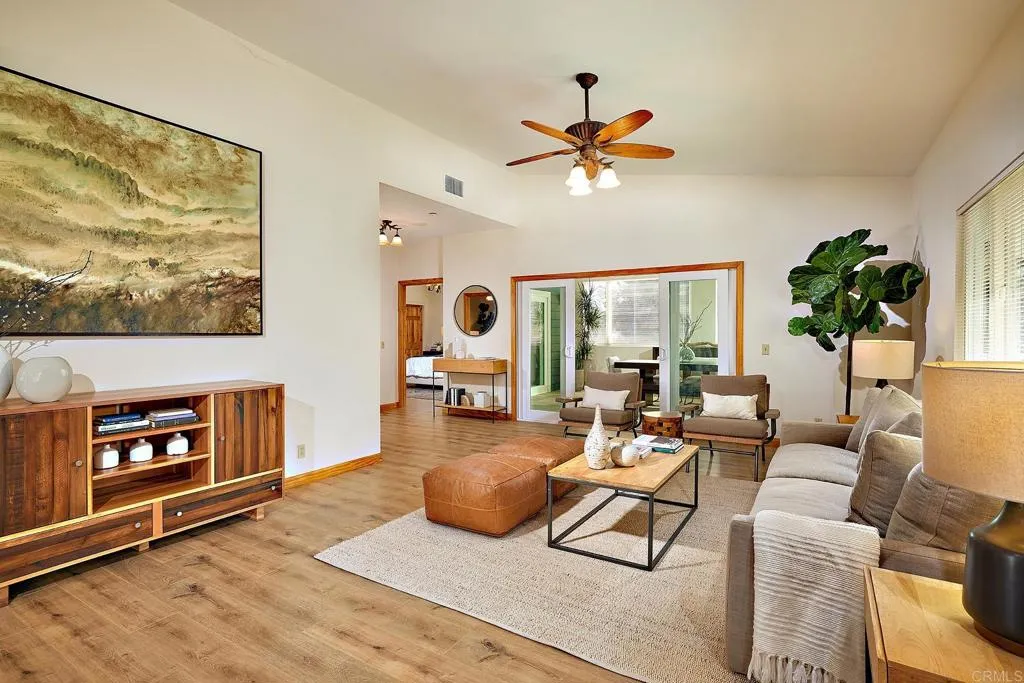 4613 Sun Valley Road Del Mar, CA 92014 - Photo 43 of 55 a living room with furniture and a large window