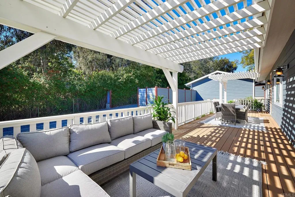 4613 Sun Valley Road Del Mar, CA 92014 - Photo 51 of 55 a roof deck with couches and wooden fence