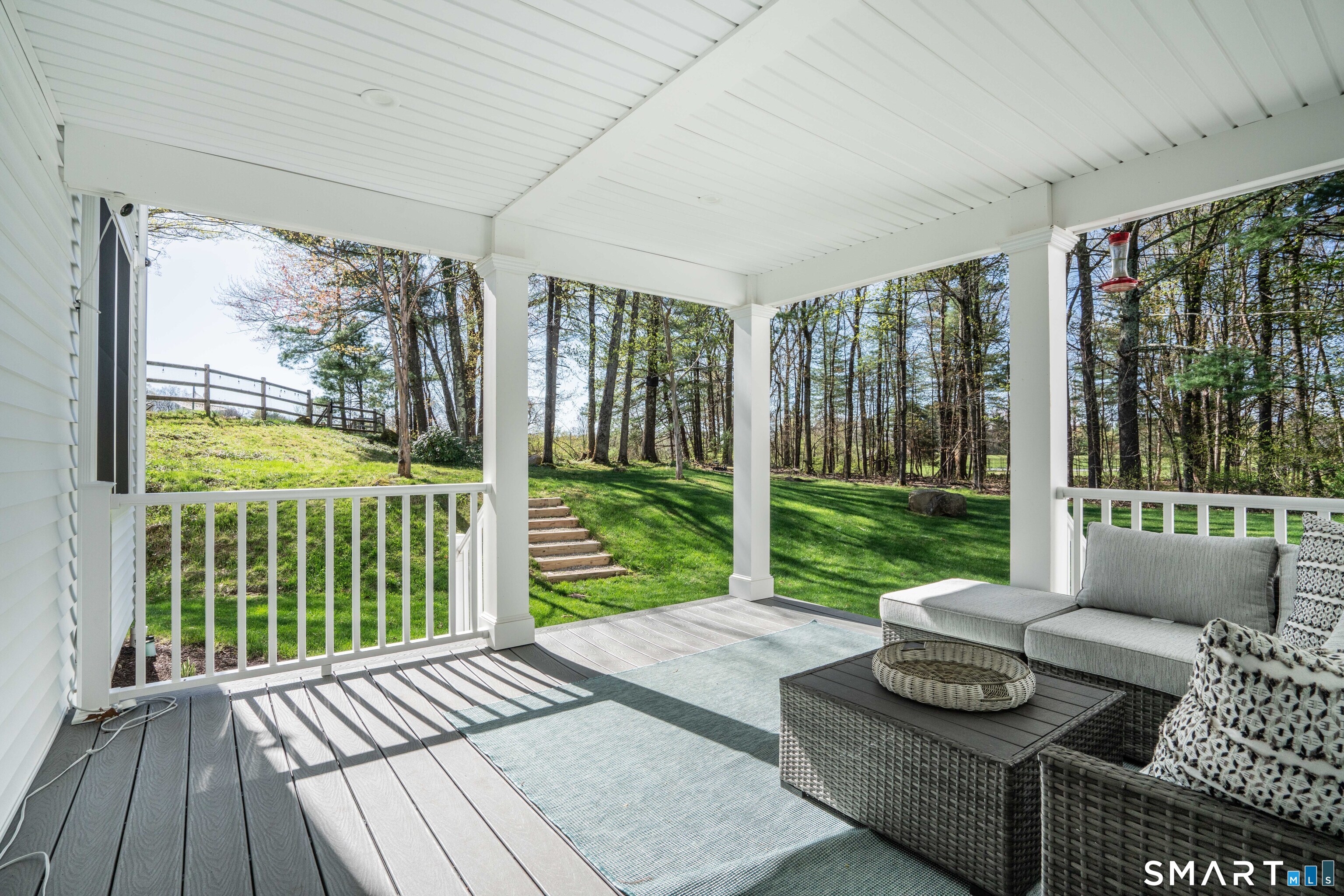 152 Old Farms Road Simsbury, CT 06070 - Photo 33 of 40 A charming covered porch overlooks the pool and backyard