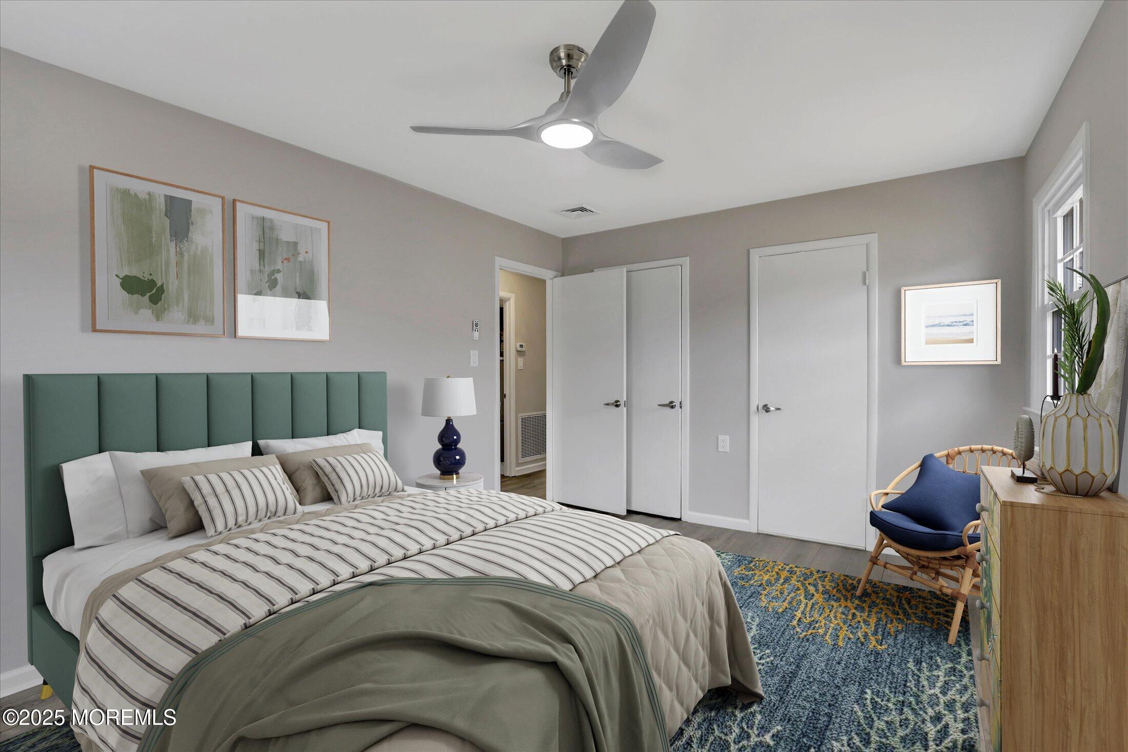 35 Patmore Road Brick, NJ 08724 - Photo 28 of 65 a bedroom with a bed and a chandelier