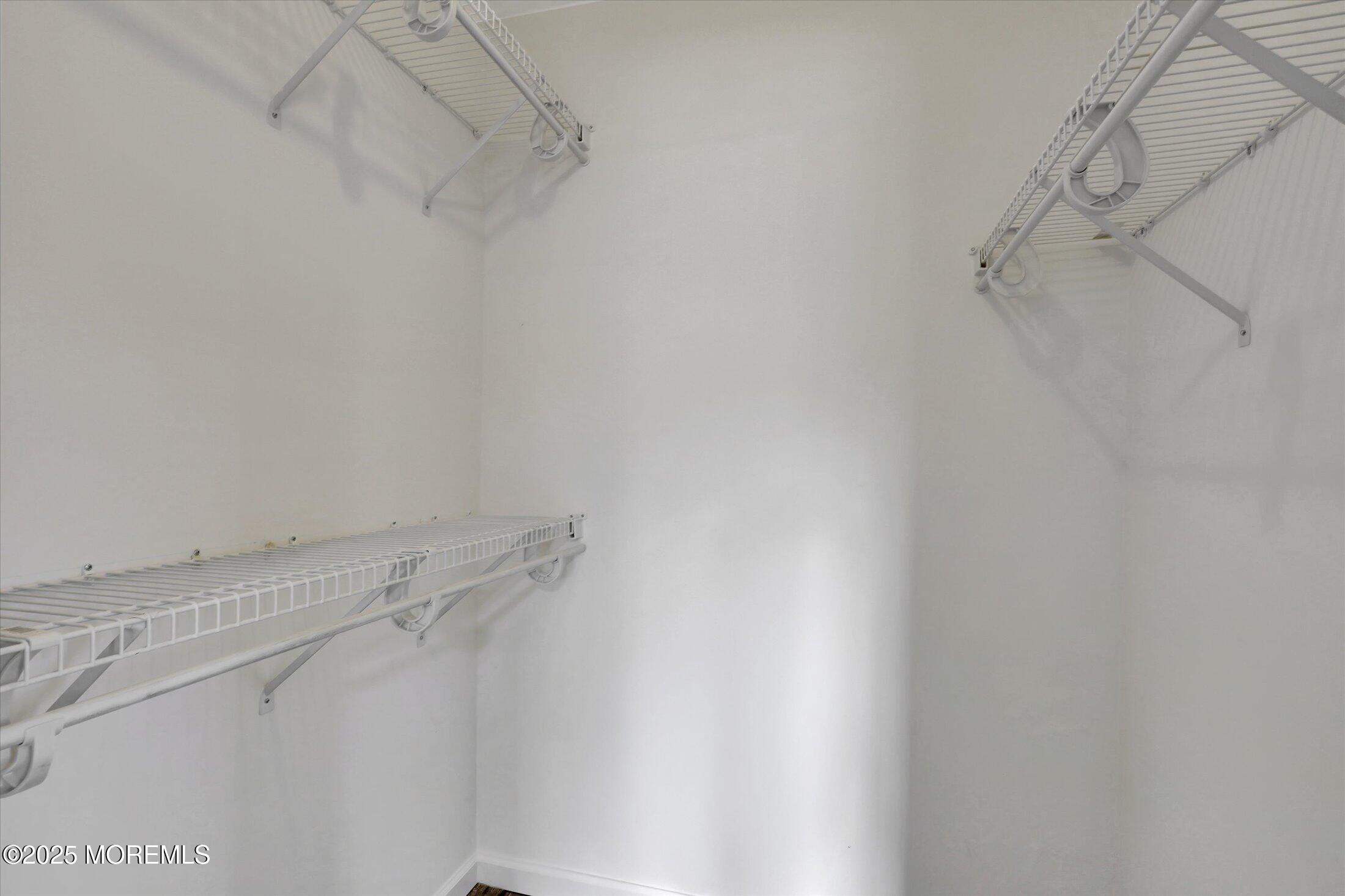 35 Patmore Road Brick, NJ 08724 - Photo 31 of 65 a view of a room with racks on the wall