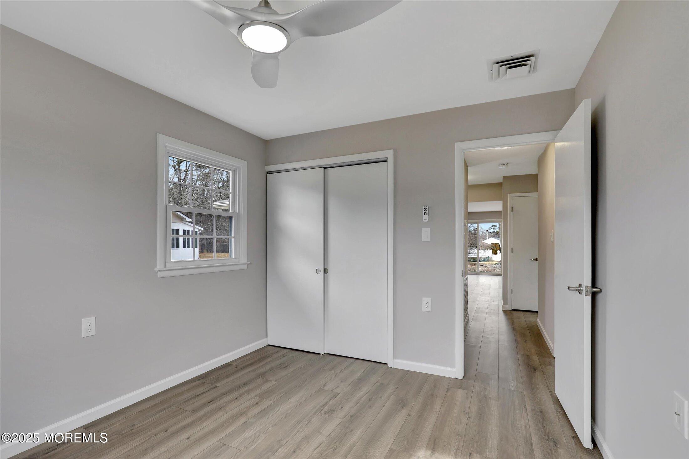 35 Patmore Road Brick, NJ 08724 - Photo 33 of 65 wooden floor in an empty room with a window