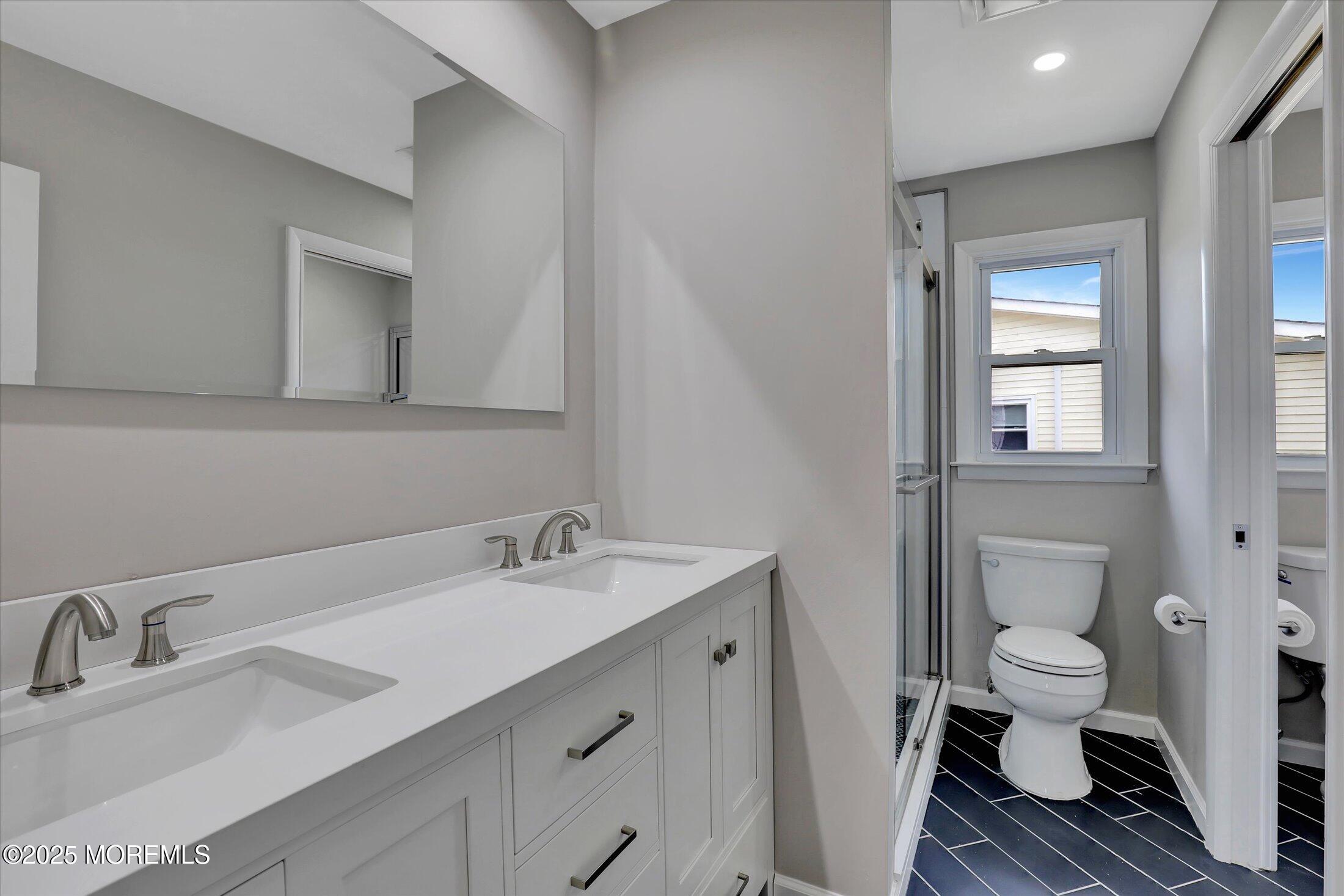 35 Patmore Road Brick, NJ 08724 - Photo 36 of 65 a bathroom with a sink toilet and shower