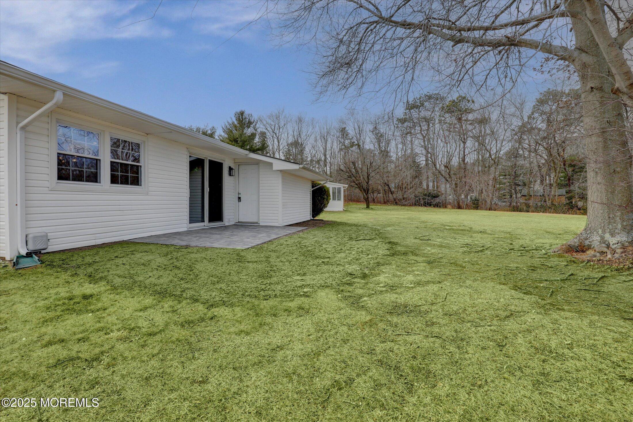 35 Patmore Road Brick, NJ 08724 - Photo 40 of 65 a backyard of a house with lots of green space