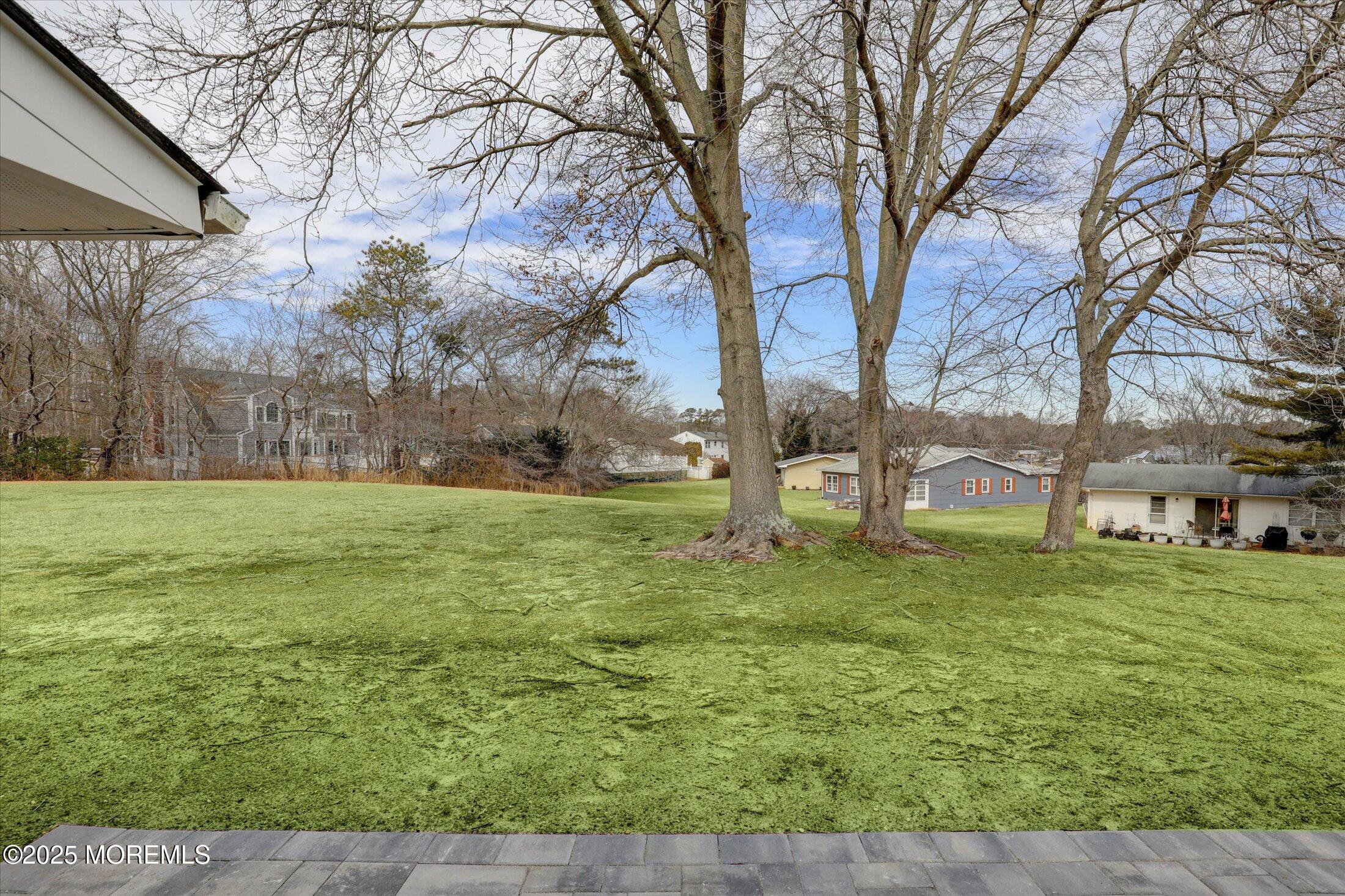 35 Patmore Road Brick, NJ 08724 - Photo 42 of 65 a backyard of a house with lots of green space