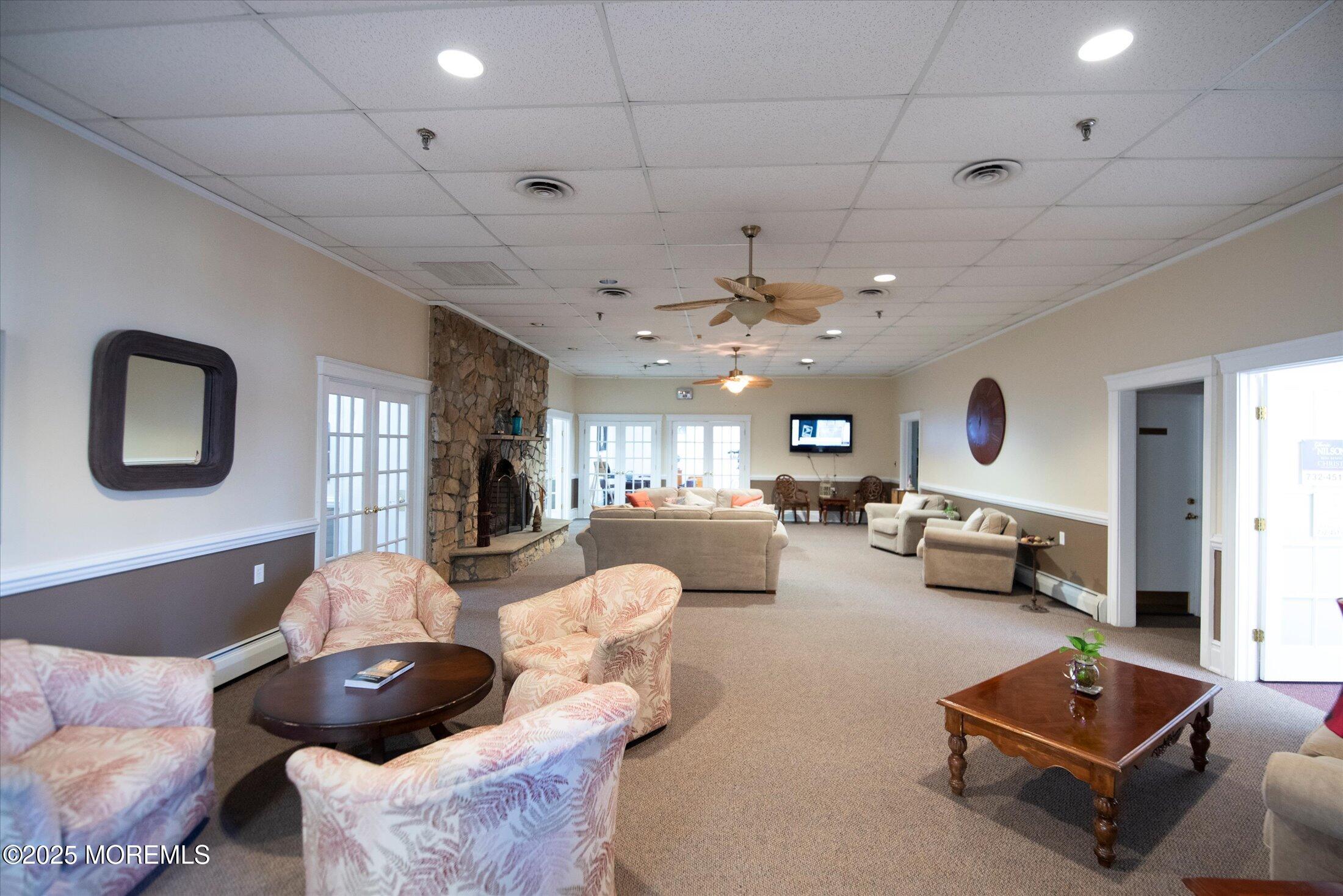 35 Patmore Road Brick, NJ 08724 - Photo 53 of 65 a living room with furniture and a chandelier