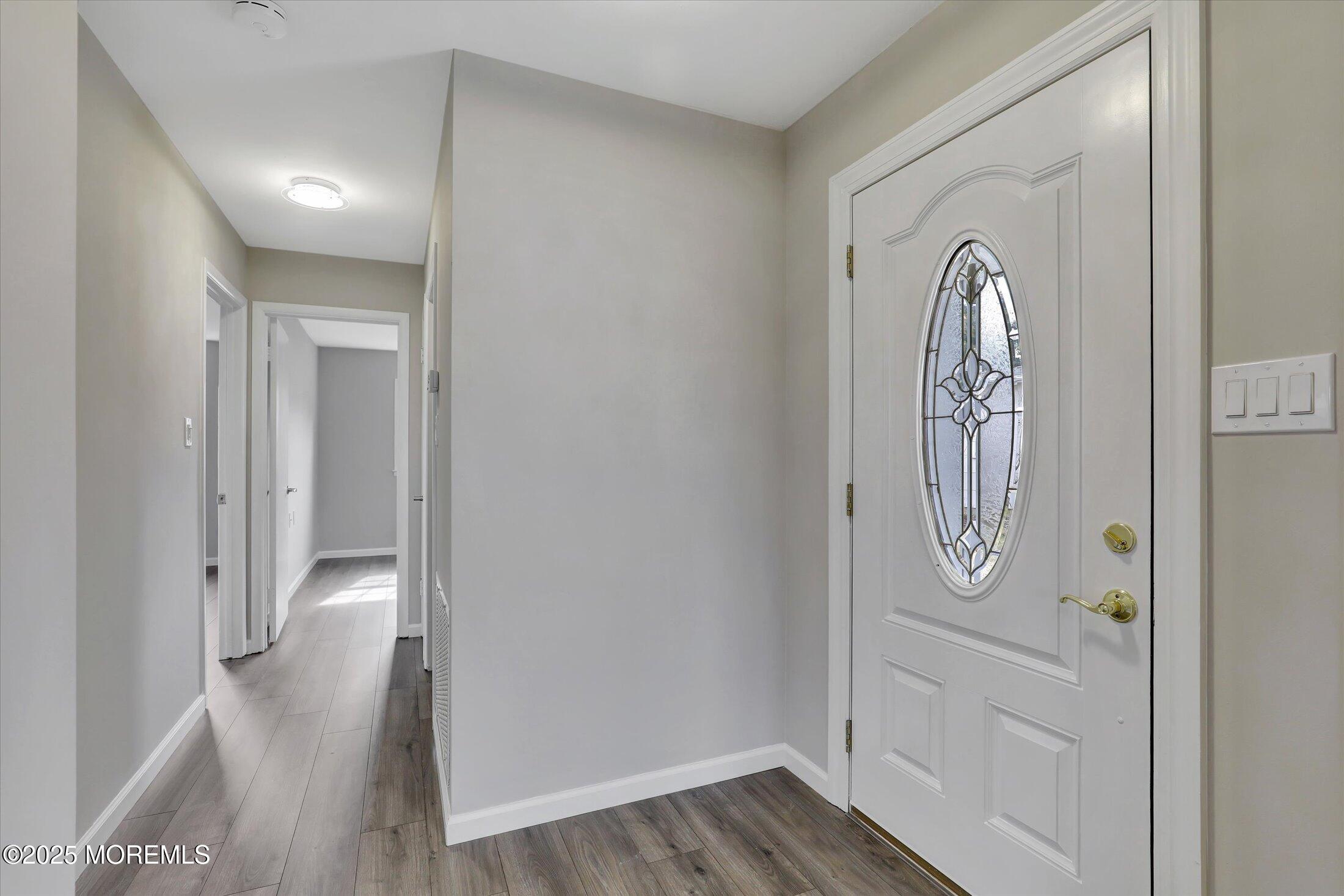 35 Patmore Road Brick, NJ 08724 - Photo 8 of 65 a view of a hallway with wooden floor