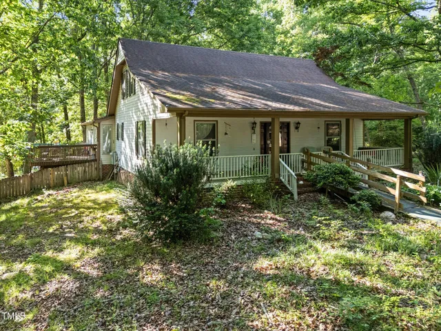 a picture of a bathroom with a shower