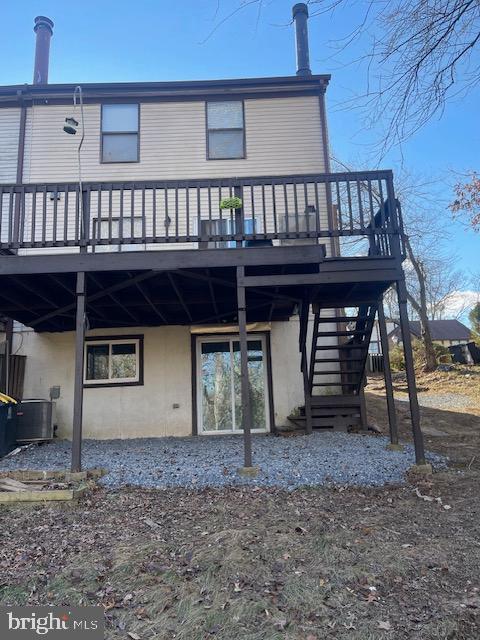 7109 Kurth Lane Lanham, MD 20706 - Photo 5 of 6 a view of a house with backyard and deck